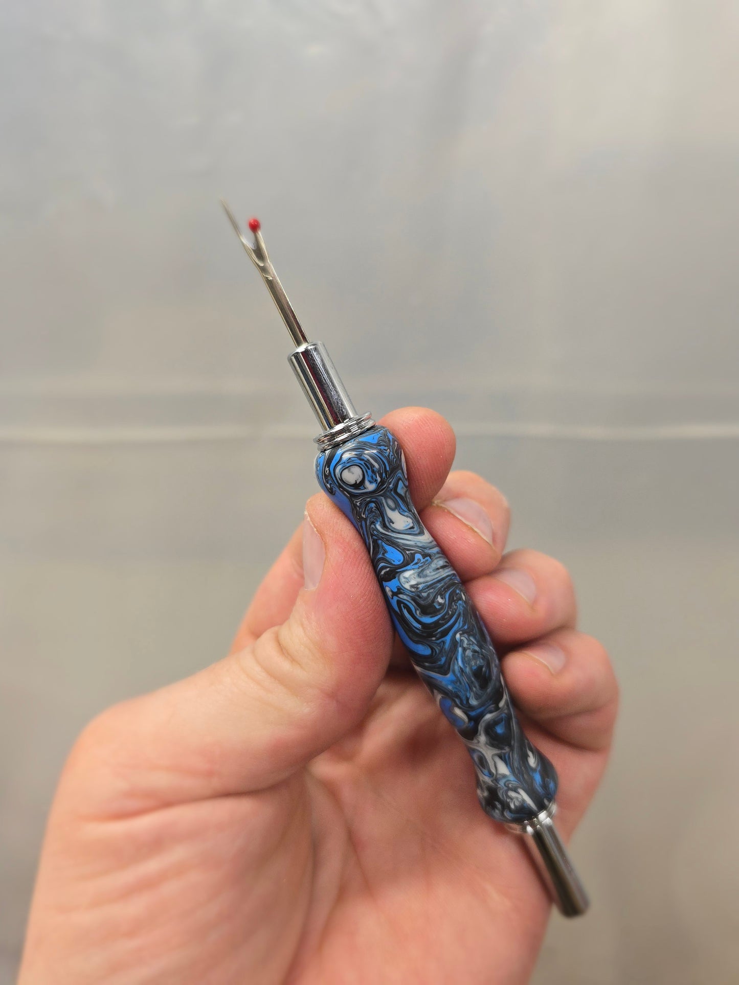 Blue, black and white - sewing seam ripper and stiletto combo tool