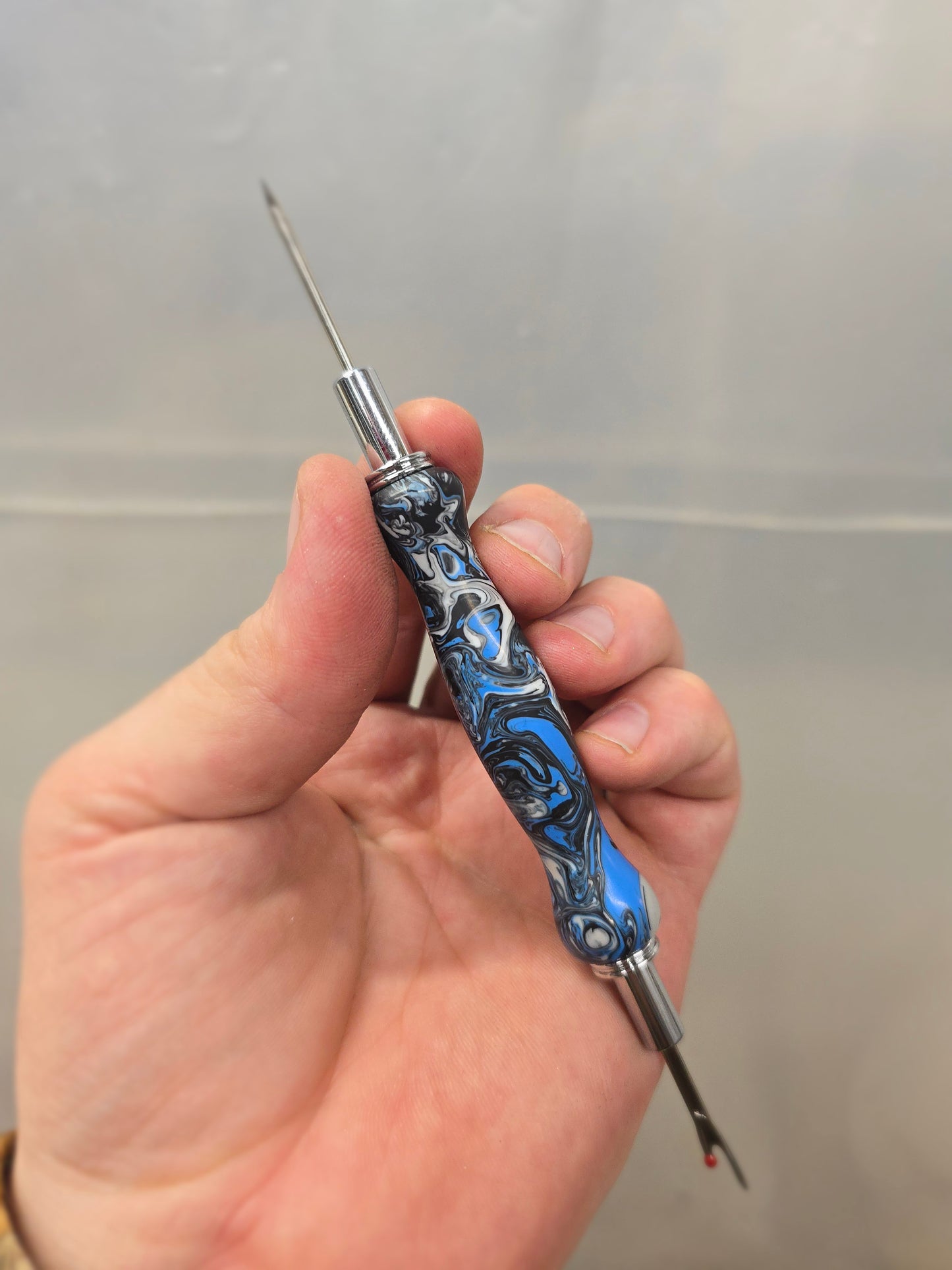 Blue, black and white - sewing seam ripper and stiletto combo tool